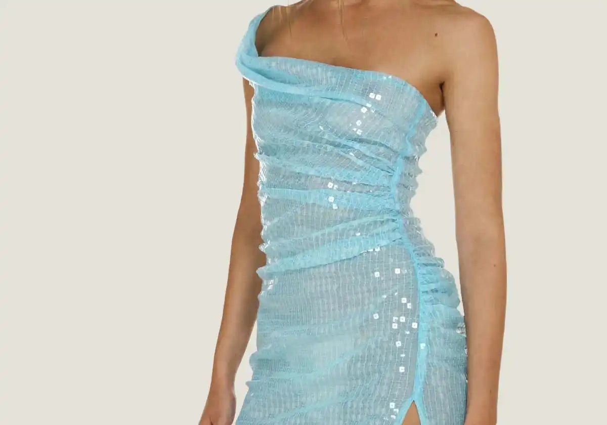 Aqua sequined one-shoulder dress.