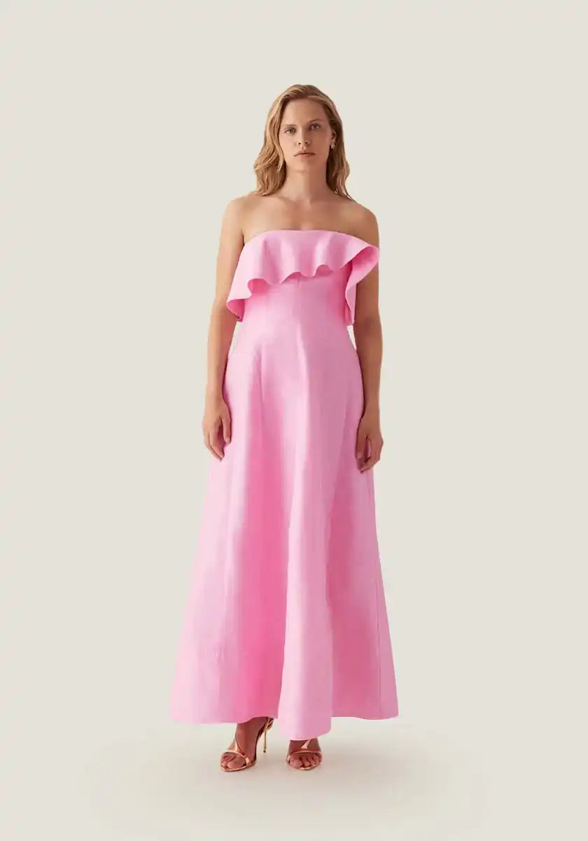 Strapless pink ruffled gown.