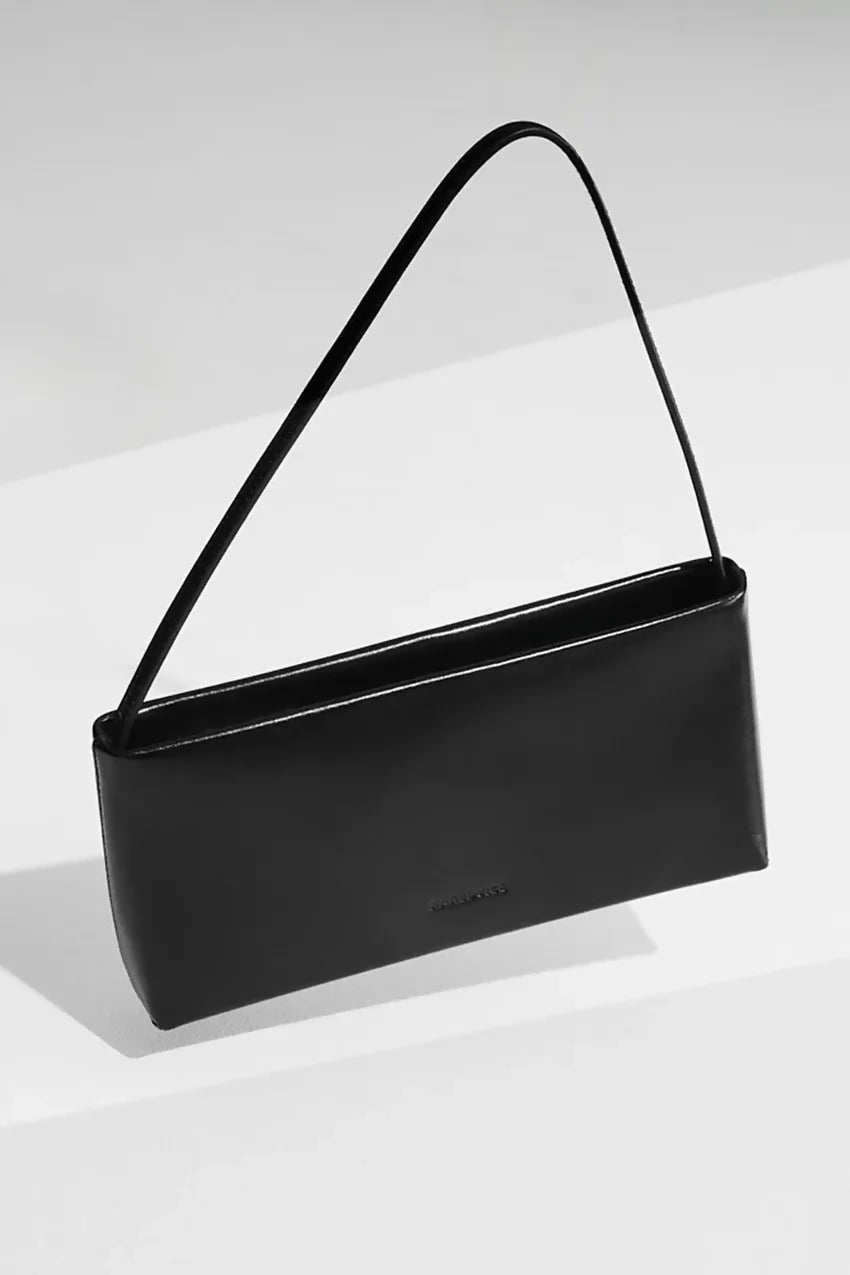 Nakedvice The Mietta Black Bag – designer dress hire
