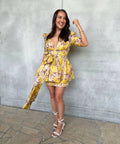 Nikki H - Zimmermann The High Tide Peplum Mini in Yellow Ikat Floral